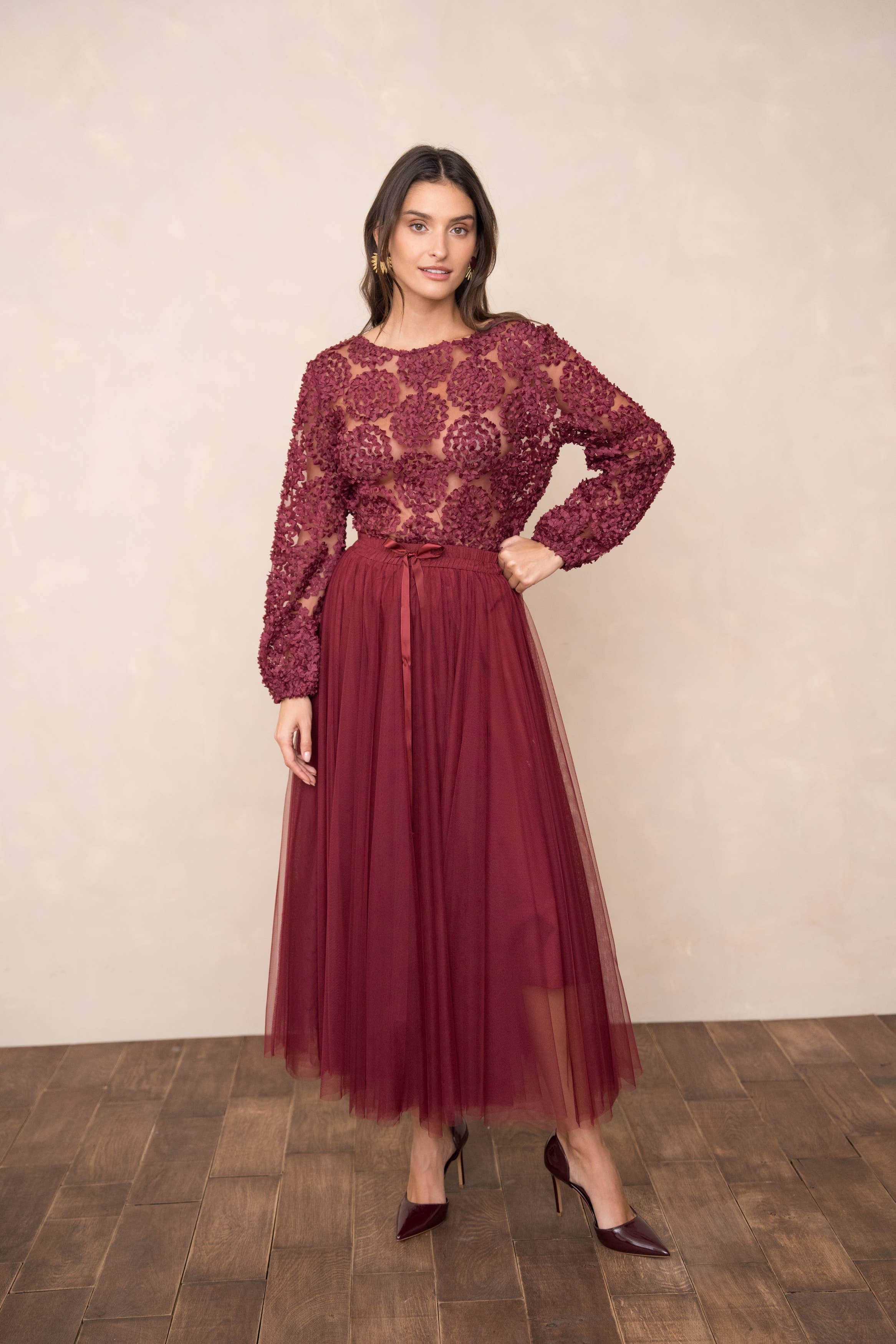 Texturerad blus med rosetter CK08022