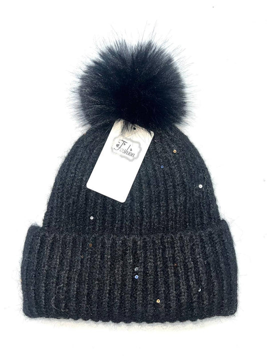 Enfärgad mössa med tofs och paljetter med foder